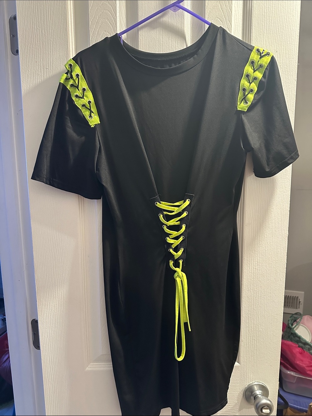 Amazon Black Mini Dress with Neon Yellow Lace-Up Accents